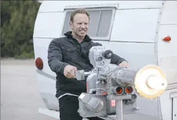  ?? Raymond Liu/Syfy ?? Like shooting fish in a barrel: Ian Ziering stars in the sixth and final “Sharknado” movie — “The Last Sharknado: It's About Time.”