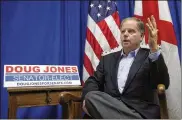  ?? AP ?? Doug Jones said his win signals that voters are looking for a less vitriolic political rhetoric and vanquished the idea that a Democrat could not win in Alabama.