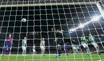  ?? — Reuters ?? Opening accounts: Paco Alcacer (not in picture) scoring Barcelona’s first goal against Sporting Lisbon at the Nou Camp.