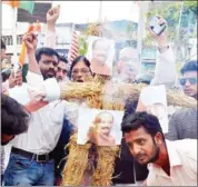  ?? AFP ?? Aam Admi Party supporters burn an effigy of Jharkhand Chief Minister Raghubar Das during a protest rally following the rape and murder of a 16-year-old girl, in the Indian city of Ranchi, on Saturday.