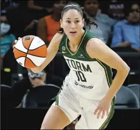  ?? Associated Press ?? Seattle Storm guard Sue Bird (10) plays during the first half of the Commission­er’s Cup WNBA basketball game against the Connecticu­t Sunon Aug. 12, 2021, in Phoenix. The Seattle Storm star and fivetime Olympic gold medalist announced Thursday that the 2022 season will be her last playing in the WNBA.