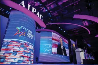  ?? Photograph: Erik S Lesser/EPA ?? Then US secretary of state Mike Pompeo speaks during the Aipac policy conference in Washington DC on 2 March 2020.