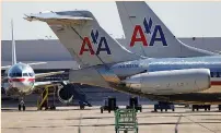  ?? (Tim Sharp/Reuters) ?? AMERICAN AIRLINES planes at Dallas/Fort Worth Internatio­nal Airport.