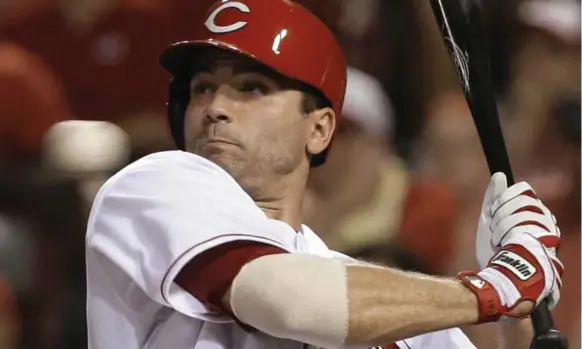  ?? AL BEHRMAN/THE ASSOCIATED PRESS ?? Cincinnati Reds slugging first baseman Joey Votto, backing away from a high inside pitch, has already earned one NL MVP back in 2010 and could claim another with a strong finish this year.