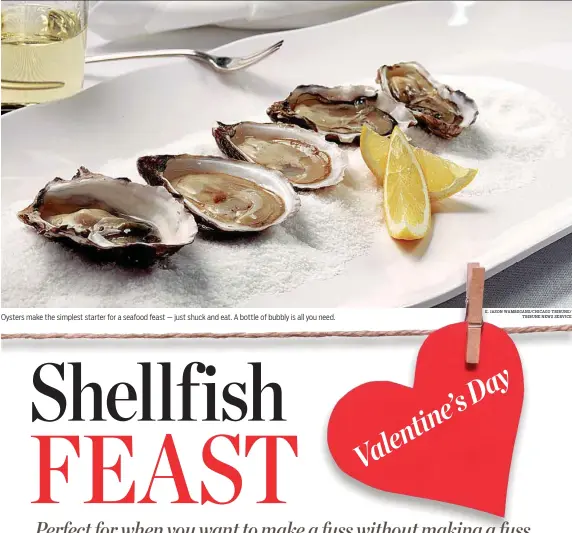  ?? E. JASON WAMBSGANS/CHICAGO TRIBUNE/ TRIBUNE NEWS SERVICE ?? Oysters make the simplest starter for a seafood feast — just shuck and eat. A bottle of bubbly is all you need.