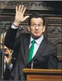  ?? Jessica Hill / Associated Press ?? Gov. Dannel P. Malloy waves after delivering his budget address in 2015.