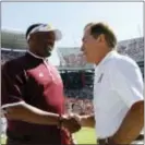  ?? BUTCH DILL — THE ASSOCIATED PRESS FILE ?? In this file photo, Texas A&M head coach Kevin Sumlin, left, and Alabama head coach Nick Saban shake hands before a game. The SEC West could be all but decided this Saturday.