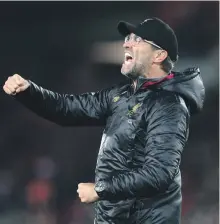  ?? AP ?? Jurgen Klopp celebrates after Divock Origi grabbed Liverpool’s last-gasp winner against Everton on Sunday