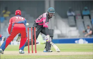  ?? Picture: MARK ANDREWS ?? IN THE NICK OF TIME: Warriors batsman Yaseen Vallie scampers to the safety of his crease during the match against the Lions at Buffalo Park yesterday