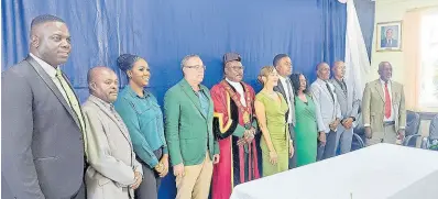  ?? GARETH DAVIS ?? From left: Orton Manahan, councillor for Hope Bay; Wayne McKenzie of Prospect; Shanique Green of Fellowship; West Portland MP Daryl Vaz; Mayor Paul Thompson; East Portland MP Annmarie Vaz; Deputy Mayor Rohan Vassel of Balcarres; Dion Hunter of Buff Bay; Athlete Cleary of Fairy Hill; Clyde McKenzie of St Margaret’s Bay, and Dexter Rowland of the Port Antonio division, are presented at the function on Thursday.