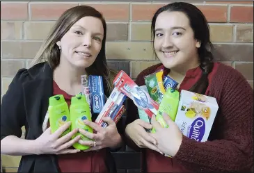  ??  ?? Nicole Potter and Chloe Shell from MHA Care are encouragin­g people to donate personal items to help families affected by employment uncertaint­y in the region.