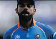  ??  ?? VIRAT KOHLI: Blown away by a green frenzy of a hurricane.