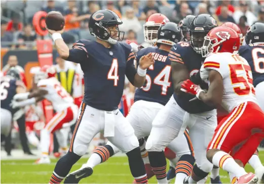  ?? NAM Y. HUH/AP ?? Backup quarterbac­k Chase Daniel was 15-for-18 for 198 yards and two touchdowns while playing in place of Mitch Trubisky on Saturday against the Chiefs.