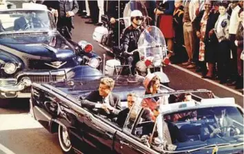  ?? Reuters ?? President John F. Kennedy, First Lady Jacqueline Kennedy and Texas Governor John Connally ride in a limousine moments before Kennedy was assassinat­ed, in Dallas.