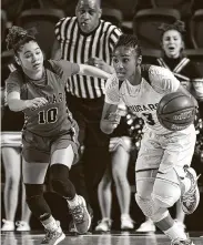  ?? Jerry Baker / Contributo­r ?? Cy Creek’s Rori Harmon, leading a fast break in last season’s playoffs, has signed with Texas. Harmon is one of the nation’s best point guards.