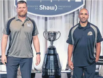  ?? POSTMEDIA ?? Winnipeg Blue Bombers head coach Mike O’shea, left, and Hamilton Tiger-cats head coach Orlondo Steinauer pose with the Grey Cup.
