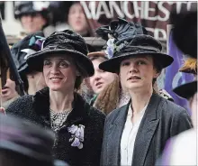  ?? STEFFAN HILL FOCUS FEATURES ?? Violet Miller (Anne-Marie Duff) and Maud Watts (Carey Mulligan) campaign for women's voting rights in "Suffragett­e."