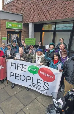  ?? Picture: Steven Brown. ?? Protesters at Glenrothes Jobcentre.