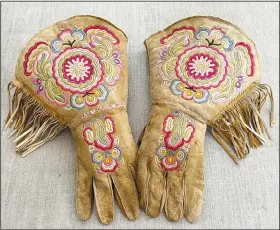  ?? (AP/Gregory Scofield) ?? A pair of gauntlets made by Scofield in the late 19th-century Cree-Metif native Canadian traditiona­l style. The Vatican’s Anima Mundi Ethnologic­al Museum houses tens of thousands of artifacts and art made by Indigenous peoples from around the world.
