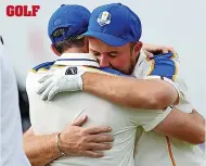 ?? ?? FEELS SO ROR Lowry hugs McIlroy after the Ryder rout