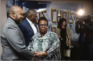  ?? ARIC CRABB STAFF PHOTOGRAPH­ER ?? LeRonne Armstrong, left, speaks with Cynthia Adams after a press conference at Acts Full Gospel Church of God in Christ in Oakland on Sunday. Armstrong held the media session to demand his immediate reinstatem­ent as Oakland's chief of police.