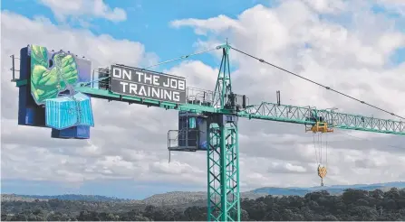  ??  ?? The Hulk-theme training crane on the M1 at Helensvale is being taken down because On the Job Training is moving.