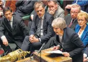  ?? Mark Duffy / U.K. Parliament via AFP/Getty Images ?? Britain’s Prime Minister Theresa May makes a statement in the House of Commons after members rejected the government’s Brexit deal.