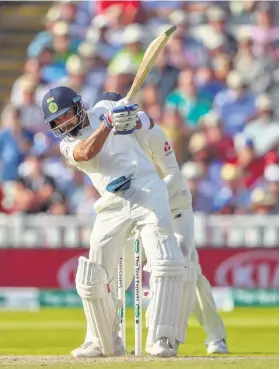  ??  ?? Exceptiona­l: Captain Virat Kohli scored a total of 200 runs in the first Test