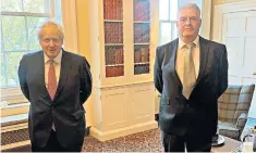  ??  ?? Boris Johnson with Lee Anderson, the Conservati­ve MP who tested positive for Covid-19