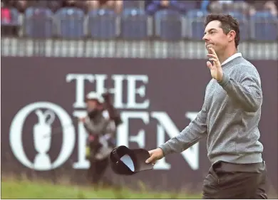  ?? AP - Jon Super ?? Rory Mcilroy waves to the crowd after the end of his round Friday. The Northern Irish star nearly rebounded from a first-round 79 to make the cut, but a missed birdie putt on No. 18 sent him home.