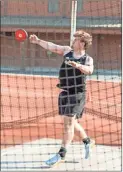  ?? Tim Godbee ?? Calhoun discus thrower Christian Bell uncorks a heave at the Yellow Jackets’ three-team meet last Thursday against Sonoravill­e and Fannin County. The Jackets won the meet for their third win of the season.