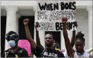  ?? ASSOCIATED PRESS FILE PHOTO ?? In this June 6file photo, demonstrat­ors protest at the Lincoln Memorial in Washington, over the death of George Floyd, a black man who was in police custody in Minneapoli­s. Floyd died after being restrained by Minneapoli­s police officers.