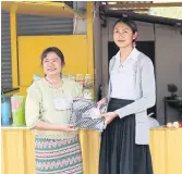  ??  ?? BELOW LEFT
Learner Jaikham, 17, operates a Thai spicy salad food stall in Ban Nai Soi that she opened during the pandemic.