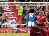  ??  ?? SPOT ON Milner’s penalty seals a dramatic late win