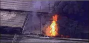  ?? WSB-TV ?? A fire that collapsed an I-85 overpass burns in Atlanta in March 2017. I-85 got fixed in record time: 43 days, for about $16.6 million, including up to $3.1 million in incentive bonuses to a contractor to get the city moving again.