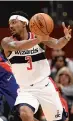  ?? NICK WASS/AP ?? Washington guard Bradley Beal also had eight assists against depleted Detroit.