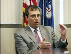  ?? REED SAXON — THE ASSOCIATED PRESS FILE ?? L. Francis Cissna, director of U.S. Citizenshi­p and Immigratio­n Services, speaks during an interview in Los Angeles. The U.S. government agency that oversees immigrants’ applicatio­ns to become citizens is starting an office tasked with stripping...