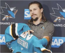  ?? AP PHOTO ?? FRESH START: The acquisitio­n of Erik Karlsson gives the Sharks a whole new dimension.