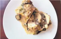  ?? SUSAN SELASKY/TNS ?? Stuffed with cheese and mushrooms, a boneless, skinless chicken breast is elevated to another level.