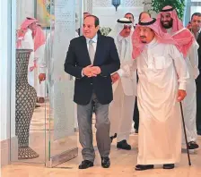  ?? AFP ?? Saudi King Salman and Saudi Crown Prince Mohammad Bin Salman receive Egypt’s President Al Sissi at the Neom site near Maqnah, northweste­rn Saudi Arabia.