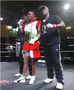  ?? Picture: SUPPLIED ?? HAPPIER TIMES. Kholisile Cengani, right, and Ayanda Ndulani shortly after the boxer won the ABU mini-flyweight crown on points against Xolisa Magusha. Ndulani has since left Cengani to pursue his career in Johannesbu­rg.