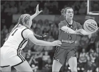  ?? AMANDA LOMAN/AP PHOTO ?? Eastern Washington guard Jamie Loera (15) passes the ball away from Oregon State guard Kennedie Shuler (1) during a game in the women’s NCAA tournament on March 22 in Corvallis, Ore.