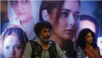  ??  ?? Pakistani screenwrit­er Shahid Nizami (left) and director Angelina Malik attending a promotiona­l event for social drama serial “Mujhe Jeene Do” (Let Me Live) in Karachi.