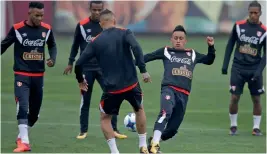  ?? — AP ?? Peru’s Christian Cueva (second from right) at practice in Lima on Tuesday.