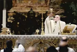  ?? REMO CASILLI POOL PHOTO ?? POPE FRANCIS leads a recent Mass for the Feast of the Epiphany at St. Peter’s Basilica. The amended church law comes amid pressure to allow female deacons.