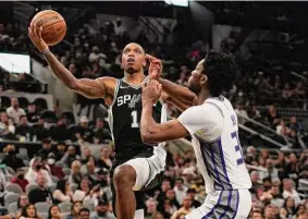  ?? Eric Gay/associated Press ?? The Spurs have until Wednesday to offer Lonnie Walker $6.3 million to make him a restricted free agent. Letting him go would save over $13 million in cap room.