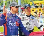  ?? PHOTO BY THE ASSOCIATED PRESS ?? Brad Keselowski, right, and Denny Hamlin wave to the crowd during driver introducti­ons before this past Sunday’s race at Richmond Internatio­nal Raceway.