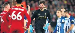  ??  ?? Red alert: Alisson leaves the field after being sent off