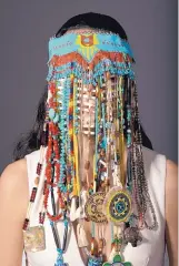  ??  ?? “Headdress,” 2015, by Dana Claxton. Two featurelen­gth films from Inuk artist Zacharias Kunuk will be playing on a loop throughout the day in the museum’s Helen Hardin Gallery.