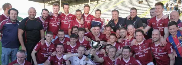  ??  ?? Castletown celebrate after coming from behind to beat Gusserane in Sunday’s final.